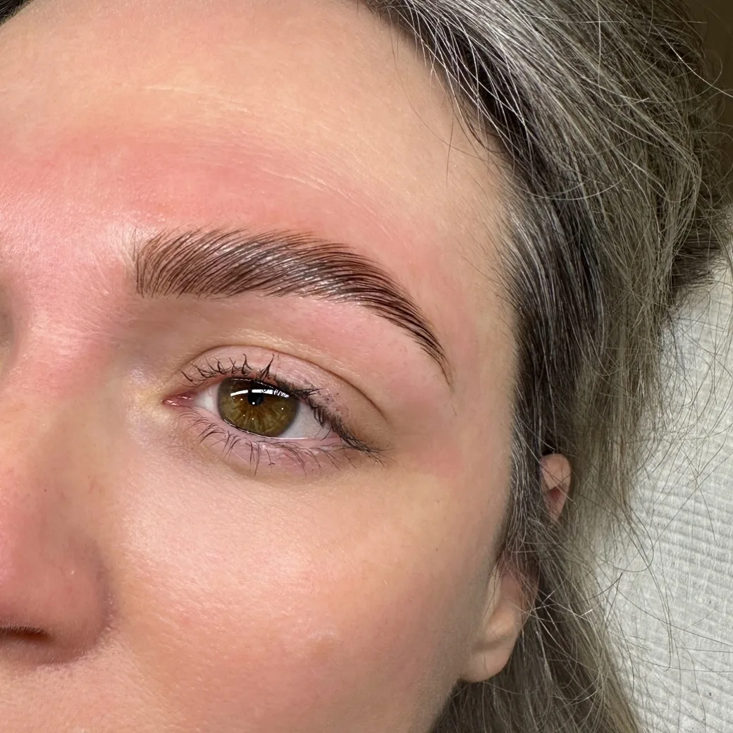 Laminated brow and subtle lash set close-up